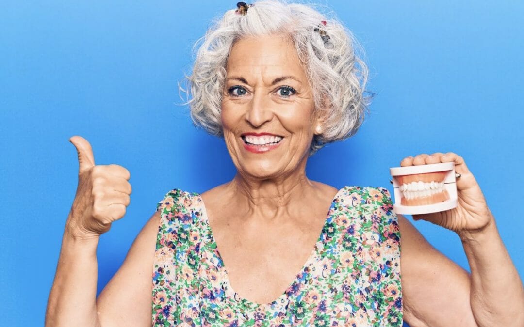 Older lady smiling with dentures