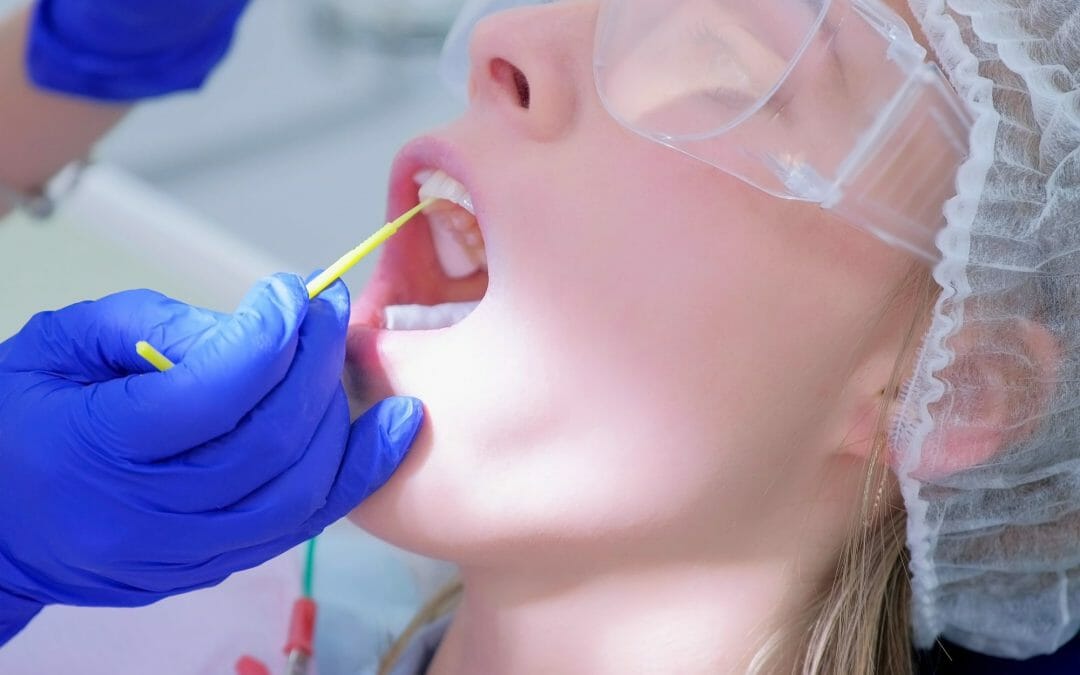 Dentist Checking Patient's Teeth