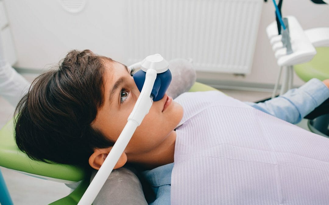 Child with Sedation Mask