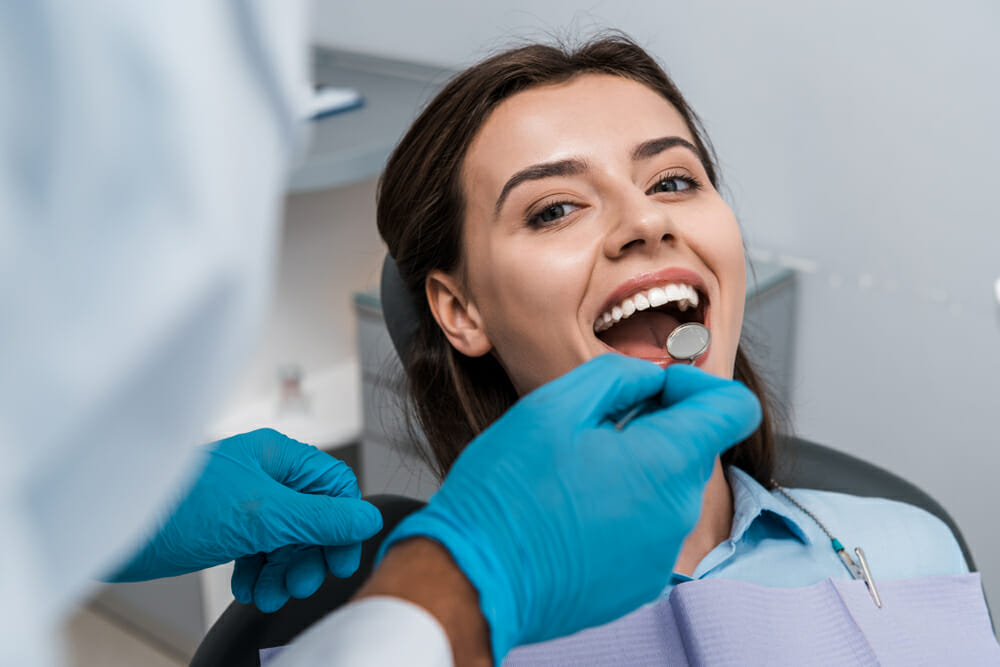 woman getting her teeth cleaned